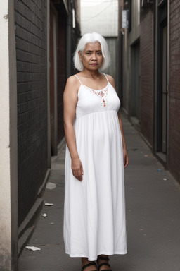 Nepalese middle-aged female with  white hair