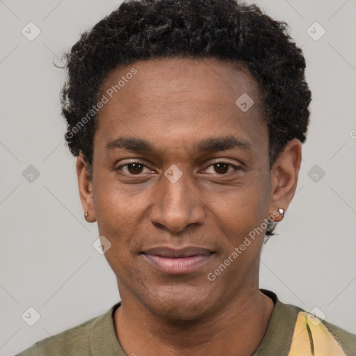 Joyful black adult male with short  black hair and brown eyes