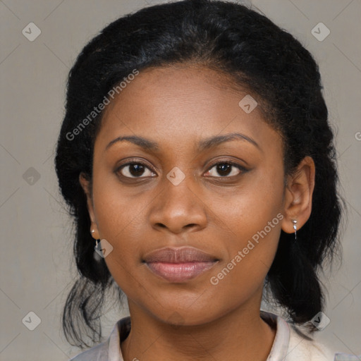 Joyful black young-adult female with medium  black hair and brown eyes