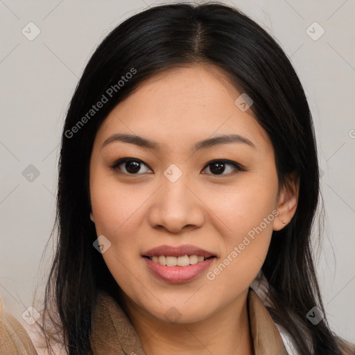 Joyful asian young-adult female with long  brown hair and brown eyes