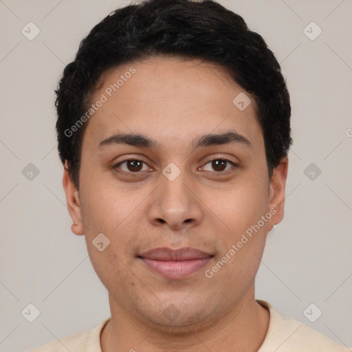 Joyful latino young-adult male with short  black hair and brown eyes