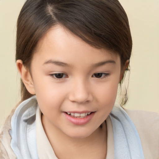 Joyful white child female with short  brown hair and brown eyes