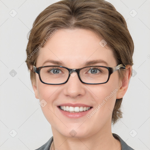 Joyful white young-adult female with medium  brown hair and grey eyes