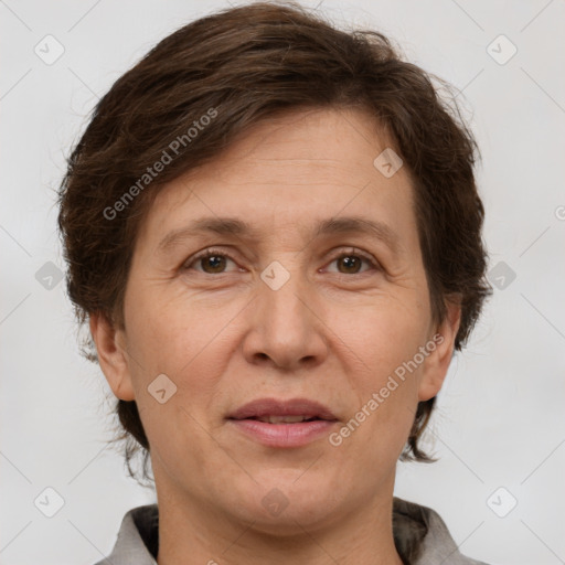 Joyful white adult female with short  brown hair and brown eyes