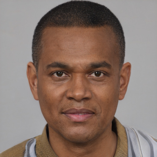 Neutral latino adult male with short  brown hair and brown eyes