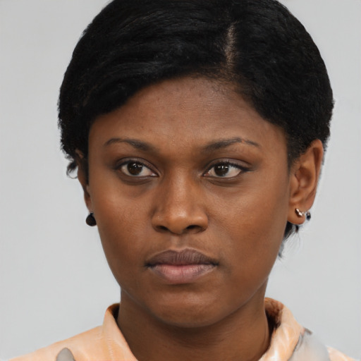 Neutral black young-adult female with short  brown hair and brown eyes