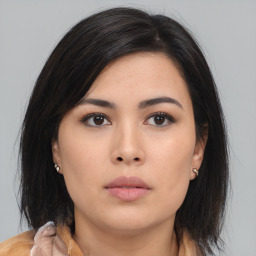 Neutral asian young-adult female with medium  brown hair and brown eyes