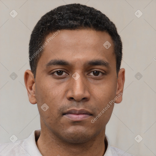 Neutral latino young-adult male with short  brown hair and brown eyes