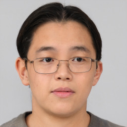 Neutral asian young-adult male with short  brown hair and brown eyes