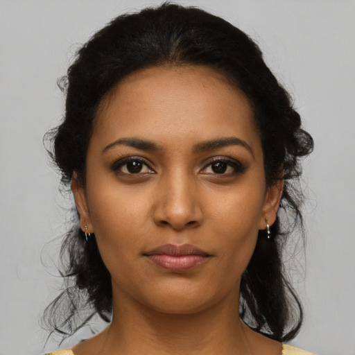 Neutral latino young-adult female with medium  black hair and brown eyes