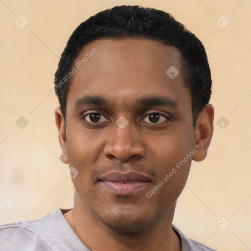 Neutral black young-adult male with short  black hair and brown eyes
