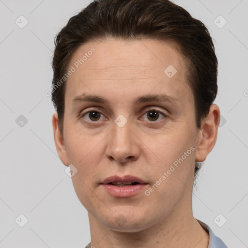 Joyful white adult male with short  brown hair and brown eyes