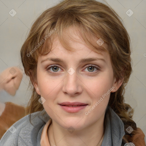 Joyful white young-adult female with medium  brown hair and blue eyes