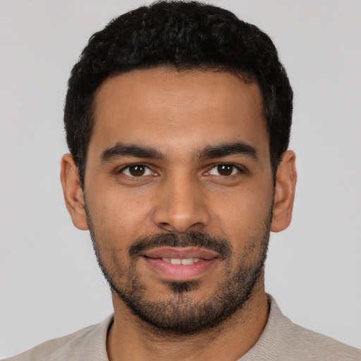 Neutral latino young-adult male with short  black hair and brown eyes