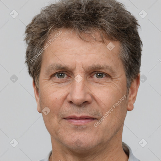 Joyful white middle-aged male with short  brown hair and brown eyes