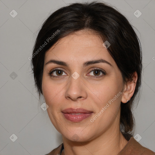 Joyful white adult female with medium  brown hair and brown eyes