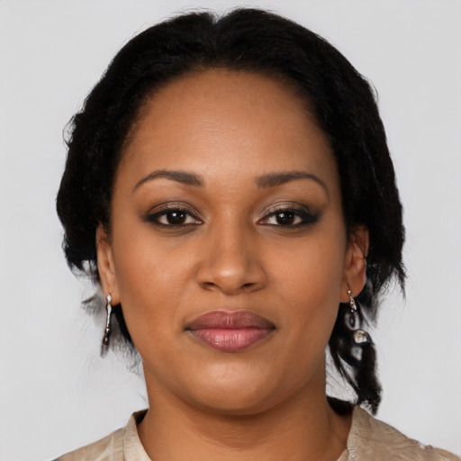Joyful black young-adult female with medium  black hair and brown eyes