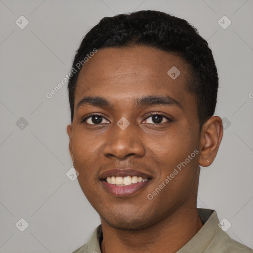 Joyful black young-adult male with short  black hair and brown eyes