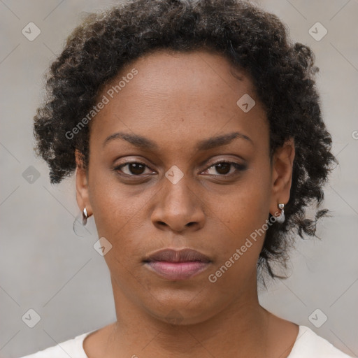 Neutral black young-adult female with short  brown hair and brown eyes