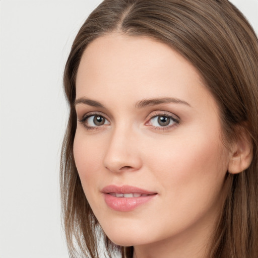 Neutral white young-adult female with long  brown hair and grey eyes