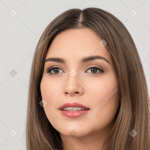 Neutral white young-adult female with long  brown hair and brown eyes