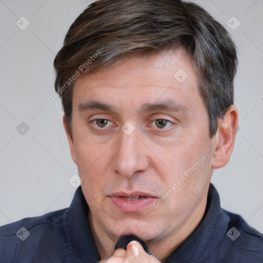 Neutral white adult male with short  brown hair and brown eyes