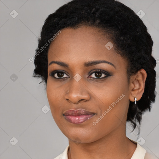 Joyful black young-adult female with medium  black hair and brown eyes