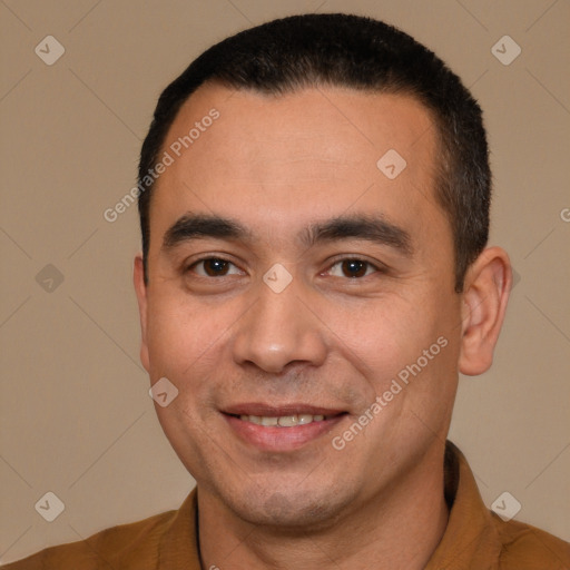 Joyful white young-adult male with short  black hair and brown eyes