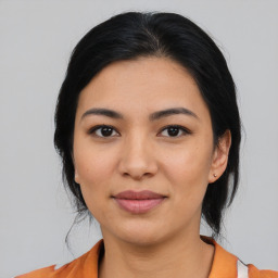 Joyful asian young-adult female with medium  black hair and brown eyes