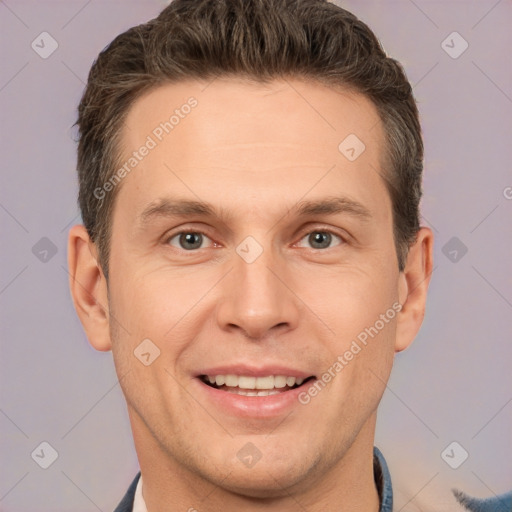 Joyful white adult male with short  brown hair and brown eyes