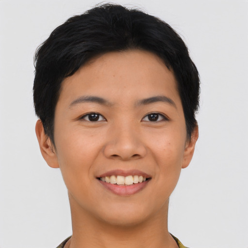 Joyful asian young-adult female with short  black hair and brown eyes