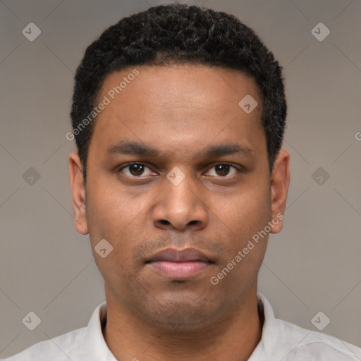 Neutral latino young-adult male with short  brown hair and brown eyes