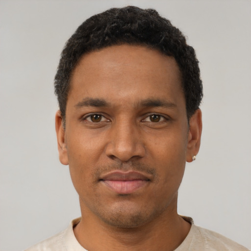Neutral black young-adult male with short  black hair and brown eyes