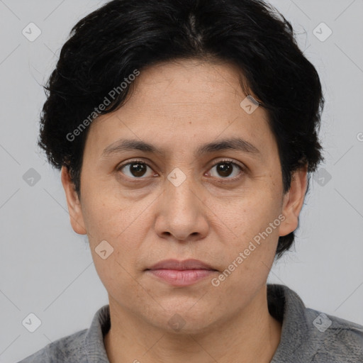 Joyful white adult female with short  brown hair and brown eyes