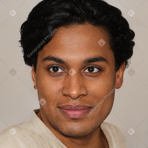 Joyful black young-adult male with short  black hair and brown eyes