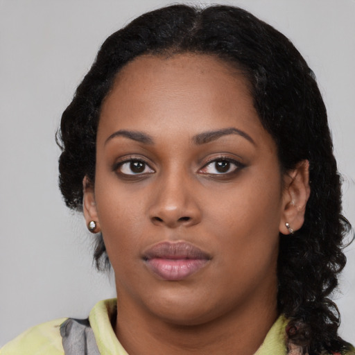 Neutral black young-adult female with medium  black hair and brown eyes