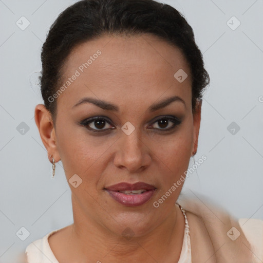 Joyful black young-adult female with short  brown hair and brown eyes