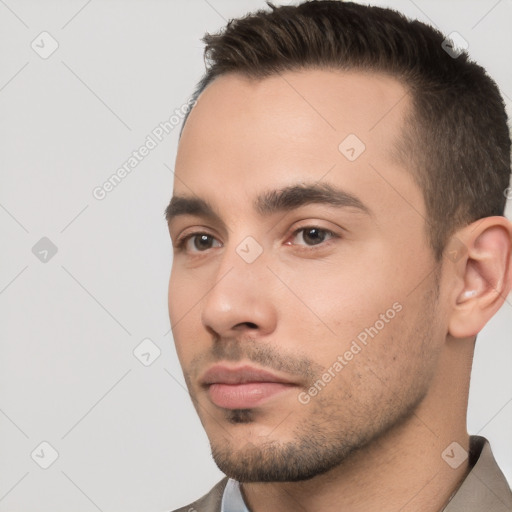 Neutral white young-adult male with short  brown hair and brown eyes