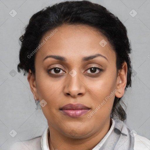 Joyful latino young-adult female with short  brown hair and brown eyes