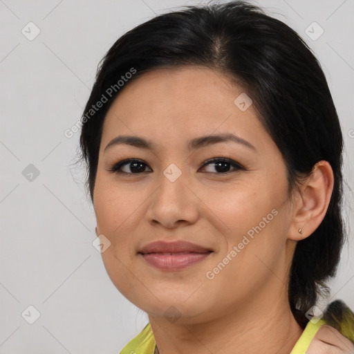 Joyful asian young-adult female with medium  brown hair and brown eyes