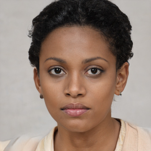 Neutral black young-adult female with short  black hair and brown eyes