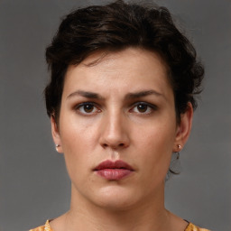 Neutral white young-adult female with short  brown hair and brown eyes