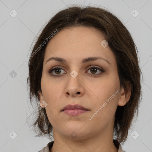 Neutral white young-adult female with medium  brown hair and brown eyes