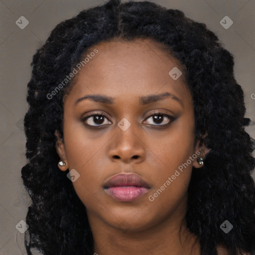 Neutral black young-adult female with long  black hair and brown eyes