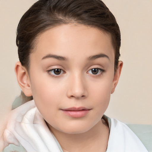 Joyful white child female with short  brown hair and brown eyes