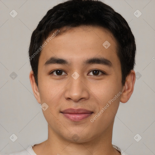 Joyful white young-adult male with short  black hair and brown eyes