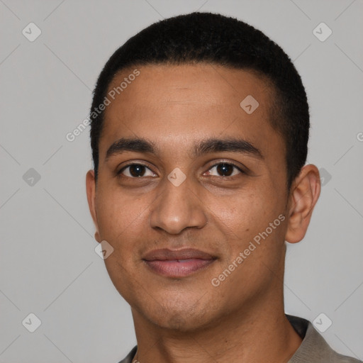 Joyful black young-adult male with short  black hair and brown eyes