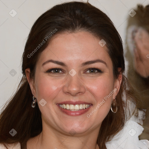 Joyful white young-adult female with medium  brown hair and blue eyes