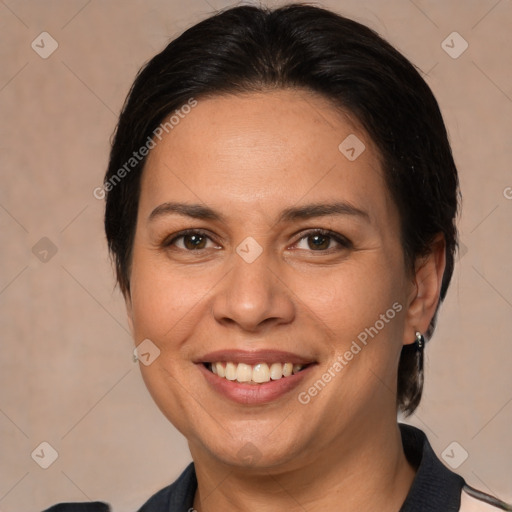 Joyful white adult female with medium  brown hair and brown eyes