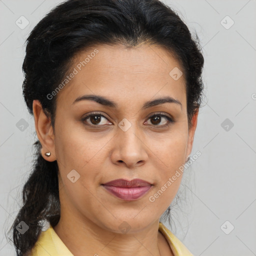 Joyful latino young-adult female with medium  brown hair and brown eyes